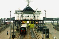 Ic3 trainset photographed at the ferryharbour in Nyborg entering the ferry Dronning Ingrid for Korsør. Photographed 26. December 1992.  The Ic3 was built by ABB Scandia in Denmark. Each unit consists of 3 coaches. Built in a number of 92 trainsets. The trainsets were put in service in 1989 - 1998. 4 diesel engines of 294 kW per trainset. Max speed 180 km/h - 112 mph. Length 58 800 mm. Weight 97 metric tonnes. 16 seats 1st class, 128 seats 2nd class. Up to 5 trainsets can be put together.